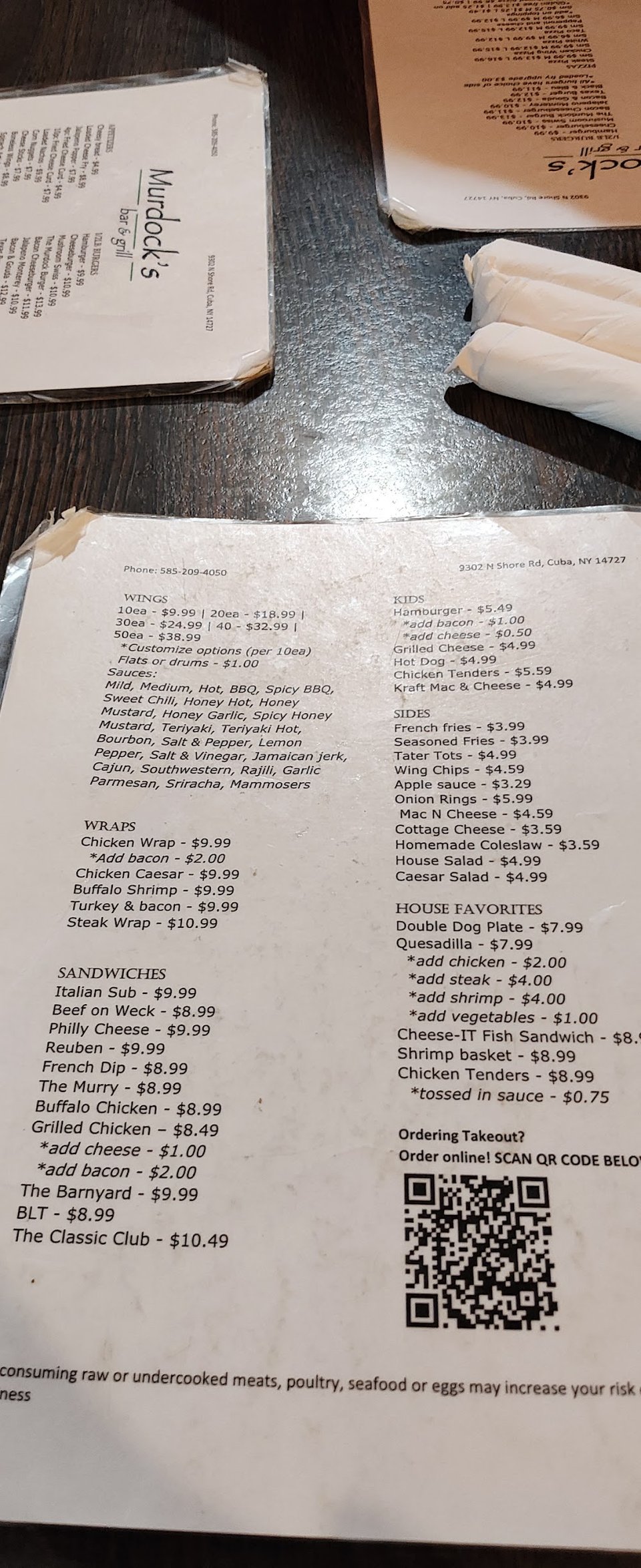 Printed menu with wings and fish fry